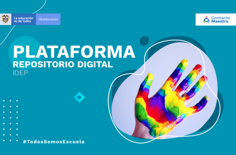 Mano de un niño pintada de pinturas de distintos colores